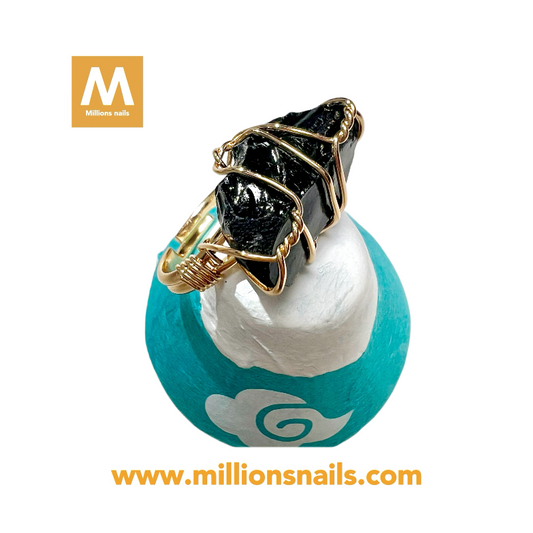 Raw crystal ring black stone - gold